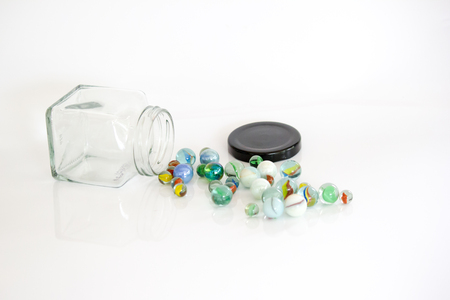 Colorful glass marbles isolated on white backgroundの写真素材