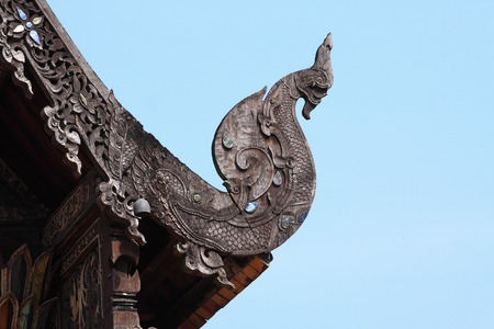 Gable apex emblazoned on the roof of the temple Thailand