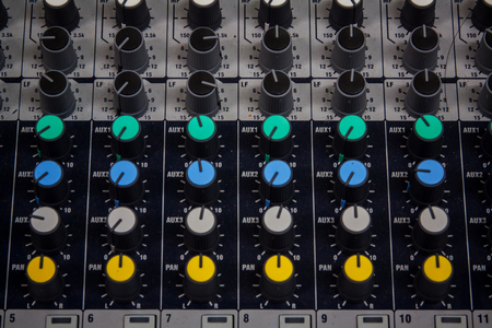 Buttons and tabs in various parts of the audio controller