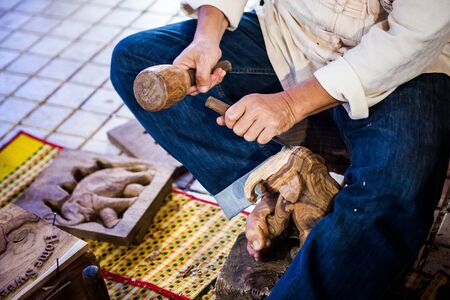 The wood carving which requires skill, experience and imaginationの写真素材