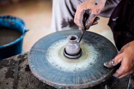 The Clay sculpture carving which requires skill, experience and imaginationの写真素材