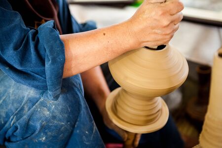 The Clay sculpture carving which requires skill, experience and imaginationの写真素材