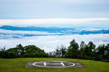 Helipad and sea fog Doi Ang Khang, Chiang Mai, Thailand's highest mountain.の写真素材