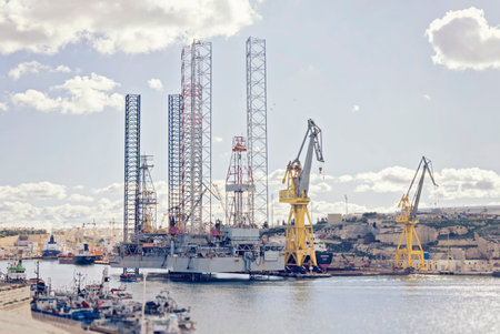 GRAND HARBOUR, VALLETTA, MALTA - DECEMBER 8, 2017: Scenic view of the large crane vessel floating...