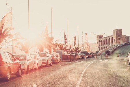 Vintage Scenic view of the evening street of Kalkara Malta in the rays of sunsetの写真素材