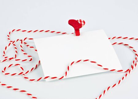 Template with place for text, red heart and ribbon on a white background. Valentine's day concept. copy spaceの写真素材