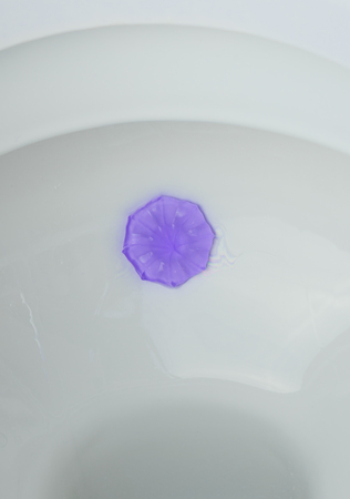 Close up air freshener gel in toilet. Clean and easy hygiene conceptの写真素材