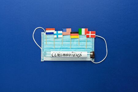 Protective surgical mask with various flags of countries.