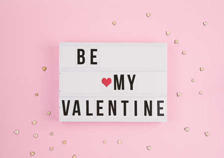 Valentines day greeting card with light box text Be My Valentineの写真素材