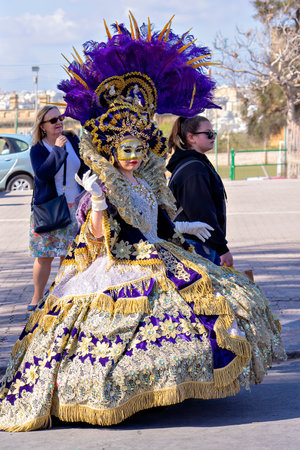 People in makeup and carnival costumes during Fat Tuesday at Mardi Gras carnival in Valletta, Maltaのeditorial素材