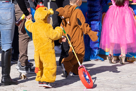 People in makeup and carnival costumes during Fat Tuesday at Mardi Gras carnival in Valletta, Maltaのeditorial素材