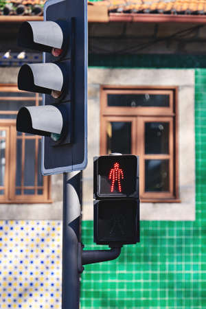 Stop-red signal at pedestrian street crossing. Warning signal, attention, and caution, closeup