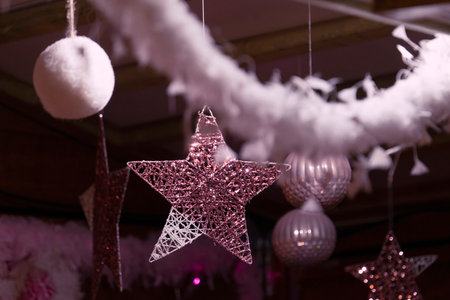 Pink Fluffy Christmas Balls and Gerland Balls Decorate Teen Girls Room During Christmasの写真素材
