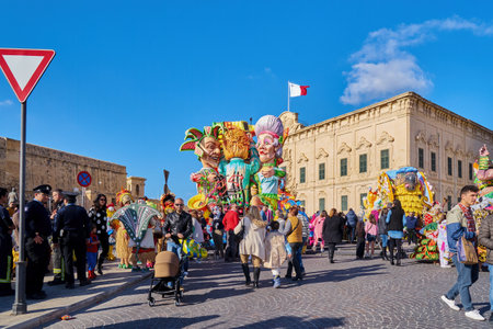 Annual Mardi Gras Fat Tuesday grand parade on maltese street of allegorical floats and masquerader procession: Valletta, Malta - February 23, 2020のeditorial素材