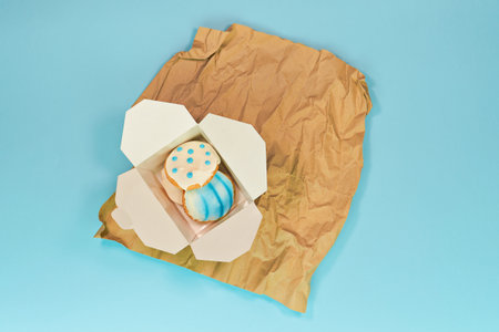 Local bakery displaying fresh Easter sweets and figolli biscuits. Local bakery fosters warm sense of...