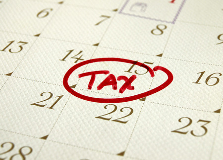 Concept for tax day or april 15th deadline for filing taxesの写真素材