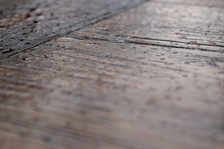 Raindrops on wood tabletop. Abstract background.の写真素材
