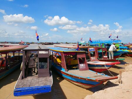 Siem Reap, Cambodia - 11 August, 2017 : Tourist boats are waiting to welcome visitors to Tonle sap Lake, Cambodia.のeditorial素材