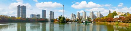 Seoul, South Korea - october 30, 2017 : Korea cityscape with Lotte World amusement park around Seokchon lake in autumn season, a major tourist attraction in Seoul, South Korea.のeditorial素材