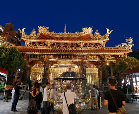 Taipei, Taiwan - July 17, 2018 : People praying at Longshan Temple of Manka, Taipei, Taiwan.のeditorial素材