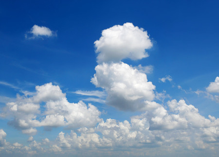 Cumulus clouds in the blue sky background.の写真素材