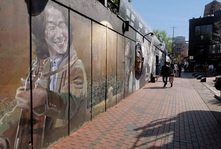 Daegu, South Korea - April 5 2019 : Kim Kwang-Seok Memorial Street. Korea Mural Street to commemorate the old folk song singer Kim Kwang-Seok in Daeguのeditorial素材