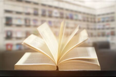 Education learning concept with opening book or textbook in modern library background.
の写真素材