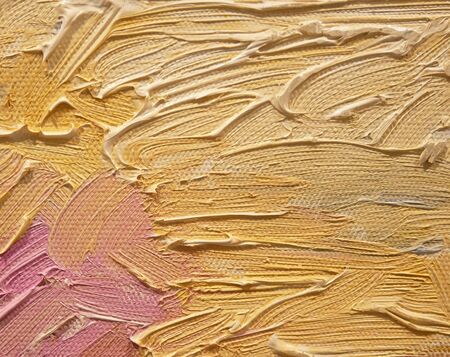 Yellow and pink color acrylic brush strokes abstract background.の写真素材