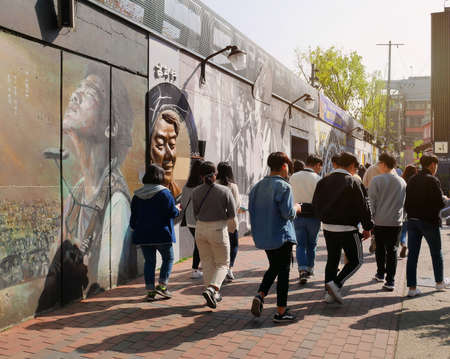 Daegu, South Korea - April 5 2019 : Tourist visit at Kim Kwang Seok Memorial Street. It is a street to commemorate the singer Kim Kwang Seok. It is a tourist attraction in Daegu, South Korea.のeditorial素材