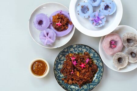 Normally Singapore breakfast  "Chwee Kueh" steamed water rice cake with fried preserved radish and chili sauceの写真素材