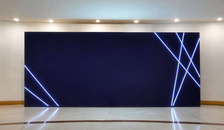 Blank billboard dark screen posters mockup in modern gallery, open space.の写真素材