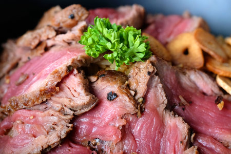 Sliced grilled medium rare beef steakの写真素材
