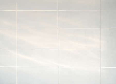 Abstract shadow overlay on tile wall texture background.の写真素材
