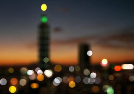 Blurred abstract bokeh background of Taipei, Taiwan city lights at twilight.の写真素材