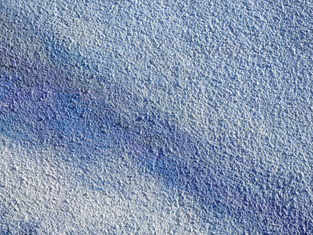 Blue painted on cement wall texture backgroundの写真素材