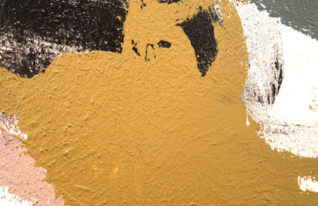 Abstract street art paintings on a concrete wall, earth tone colors background textureの写真素材