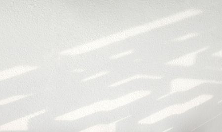 Abstract shadow of window on white concrete texture background, overlay effect for photo, mock up, product, wall art, design presentationの写真素材