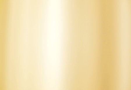 Gold gradient background with soft glowing backdrop texture. Abstract background with gradient blur design.の写真素材