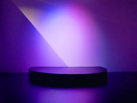 Illuminated pedestal podium display on purple background, Empty room background. Product presentation, mock up, cosmetic background.の写真素材