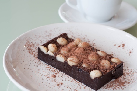 macadamia brownie on a white plateの写真素材