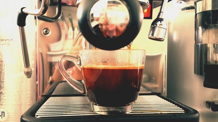 Hot americano from espresso machine in the coffee shop.の素材