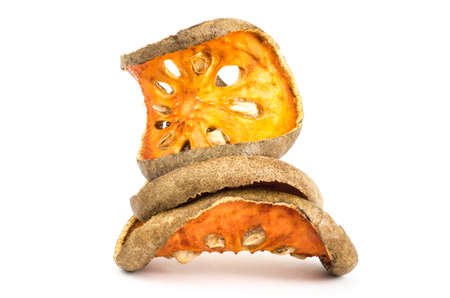 Dried bael fruit on white backgroundの写真素材