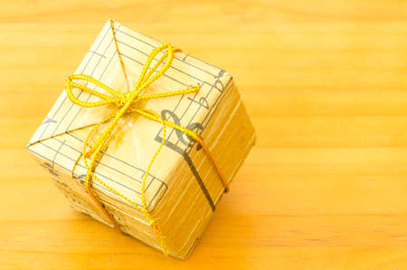 Colorful gift box on wooden backgroundの写真素材