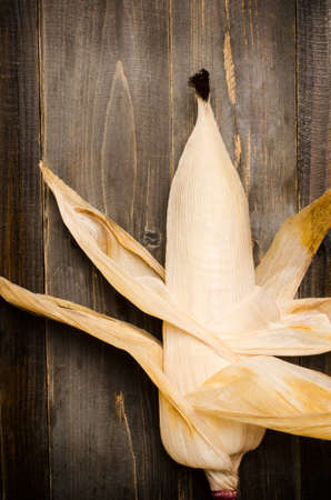 Purple corn on wooden backgroundの写真素材