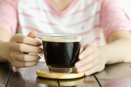 A cup of hot coffee ready to drinkingの写真素材