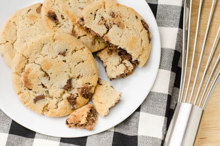 Homemade chocolate cookies on fabric background