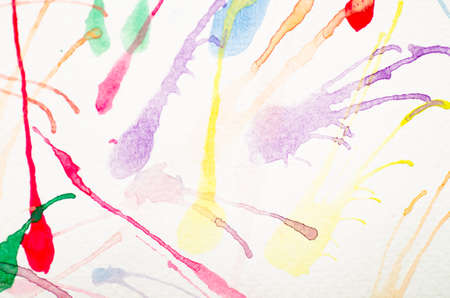 Colorful watercolor blowing on white paper,abstract backgroundの写真素材