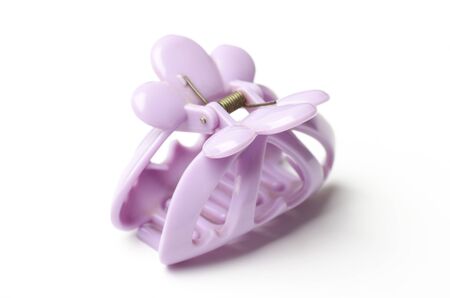 Purple hair clip on white backgroundの写真素材