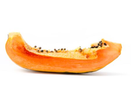 Slice of ripe papaya fruit on white backgroundの写真素材