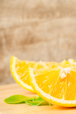 Fresh navel orange fruit on wooden background,healthy foodの写真素材